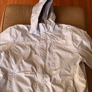 Silver North Face rain jacket